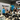 Interactive STEM workshop setup with blue storage unit and attendees at learning stations | Forward Education