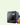 3D printer with build platform, extruder head, and spools of colored filament | Forward Education