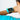 Bright blue wristband with black circuit board featuring grid pattern and gold connectors | Forward Education