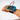 Micro:bit wearable device in blue case worn on child's wrist with purple strap | Forward Education