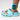 Micro:bit wearable armband with blue case and black circuit board on light blue clog shoe | Forward Education