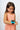 Young student wearing blue rechargeable battery pack on wrist for micro:bit coding device | Forward Education