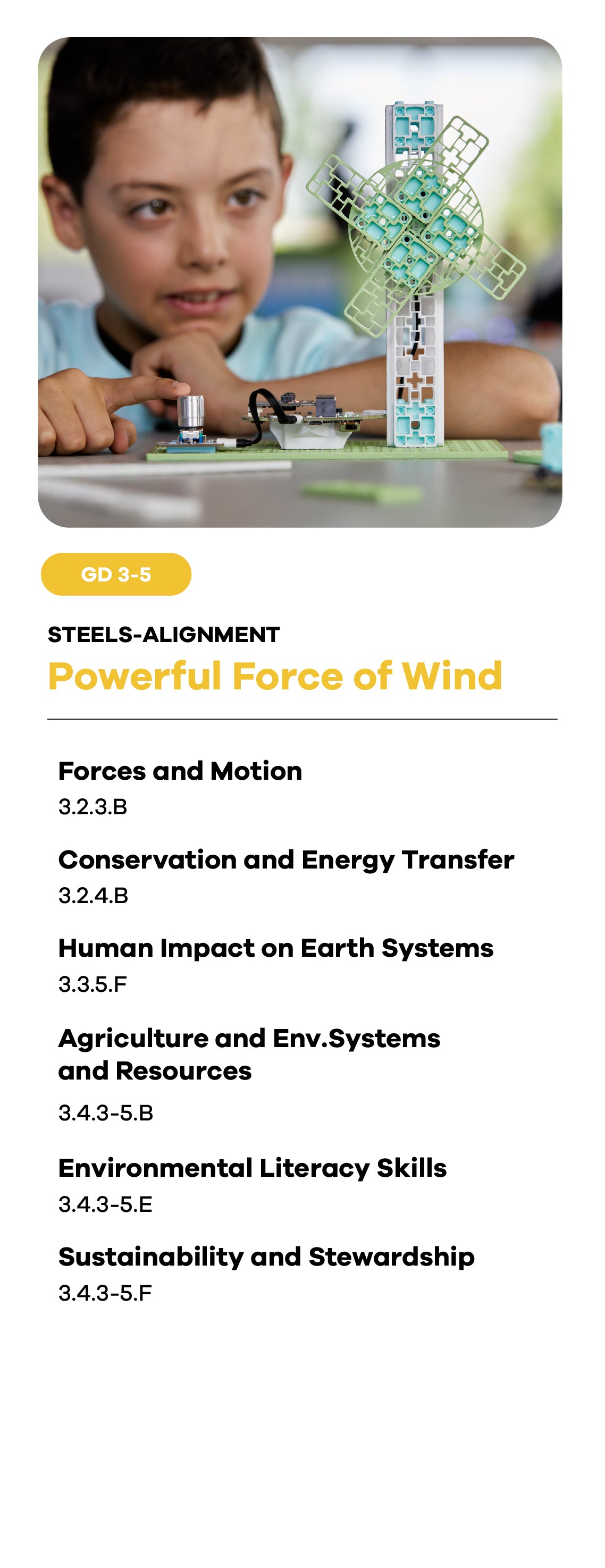 Boy demonstrating wind turbine model with rotating blades and circuit board base | Forward Education