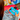 Blue handheld gaming device with screen displaying colorful pixel graphics and joystick control | Forward Education