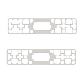 Two gray plastic frame connectors with white rectangular mounting slots and center openings | Forward Education