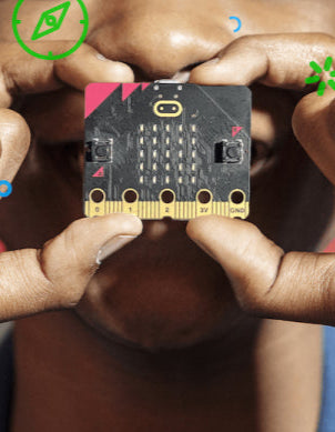 Black microcontroller board with grid of gold pins held in hands | Forward Education